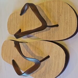 Mens Brown and Tan Straw Flip Flops Indoors